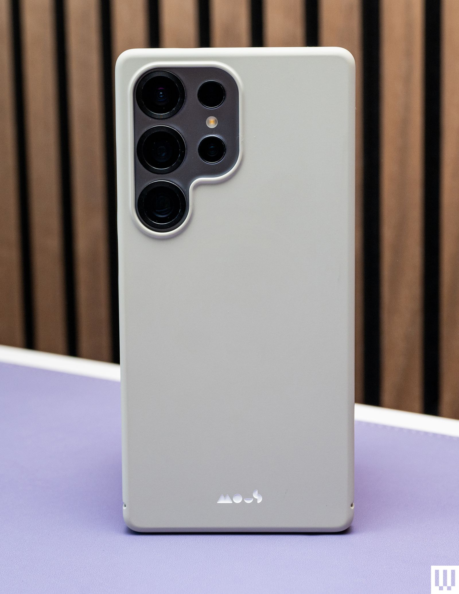 Mous Super Thin 2.0 Magnetic Case a beige case on the back of a mobile phone