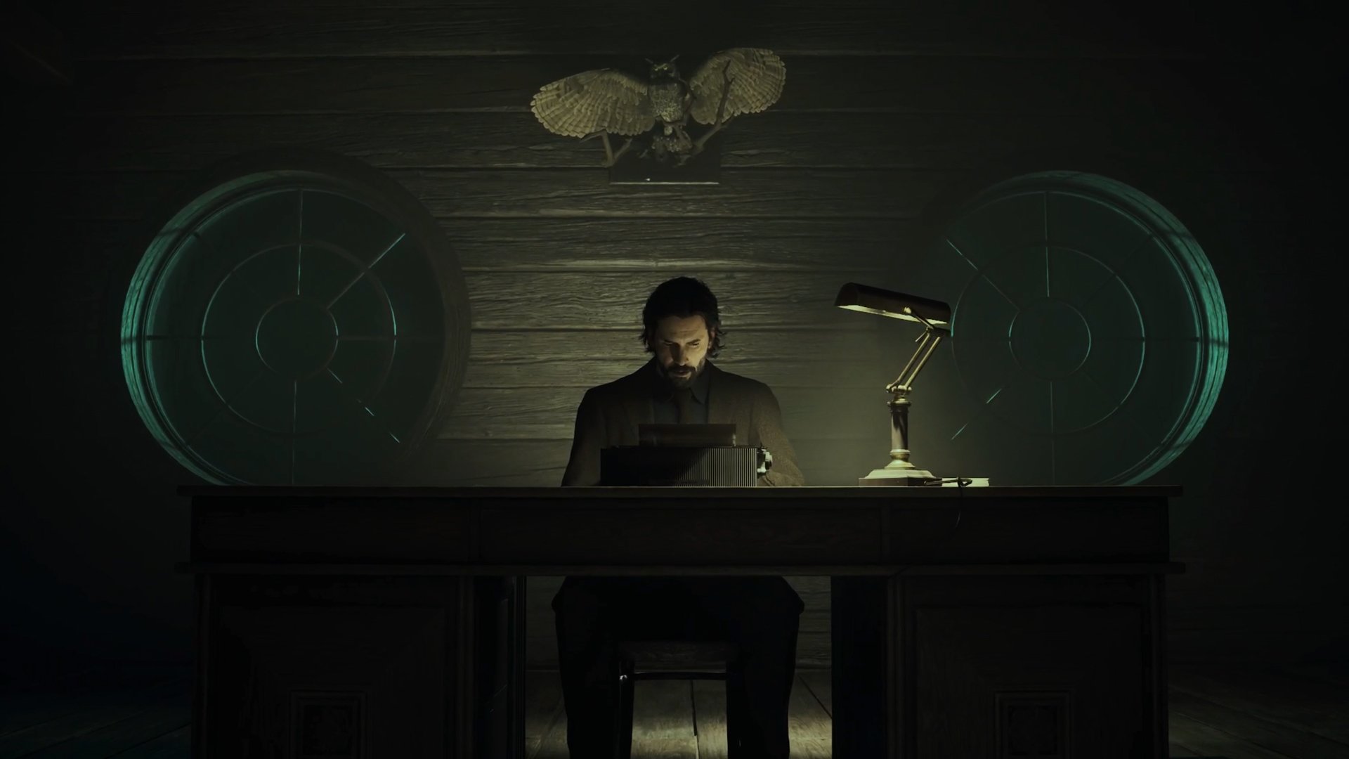 Alan Wake sits at a typewriter.
