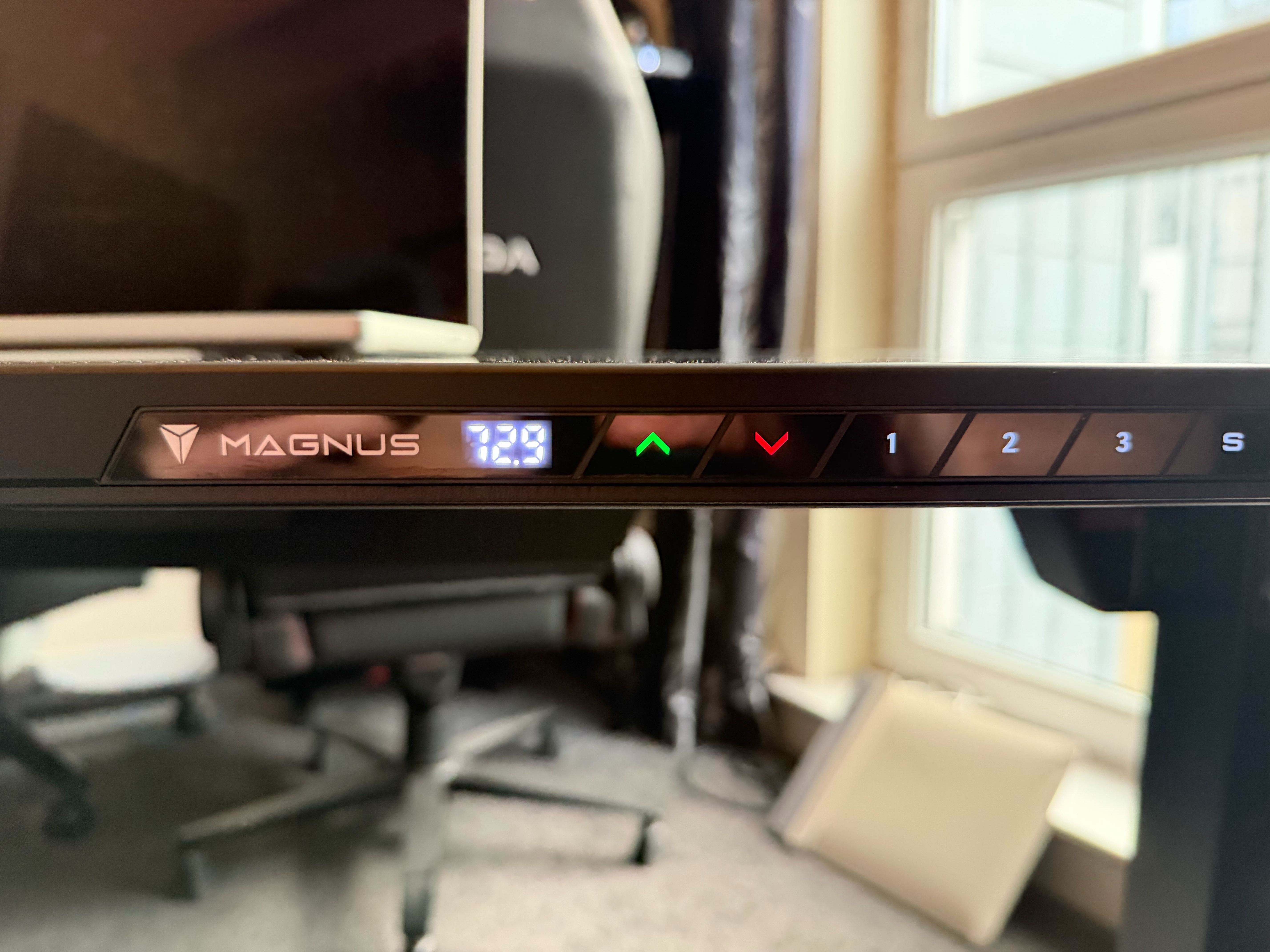 Secretlab Mangus Evo sit/stand buttons.